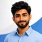 RJ Packers and Movers friendly Indian male customer portrait, natural smile, neutral premium background with very subtle blue-and-white logistics accent