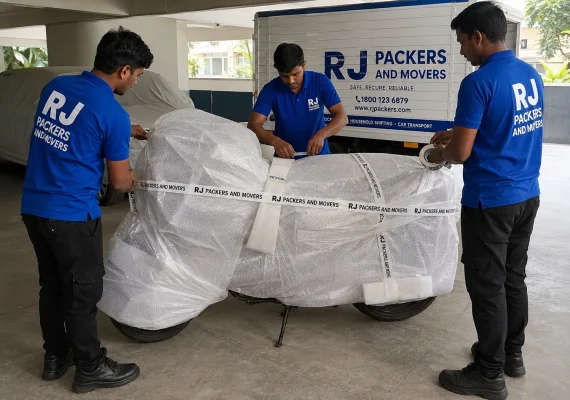 RJ Packers and Movers rJ Packers and Movers crew professionally packing a motorcycle with foam, bubble wrap, and straps before loading